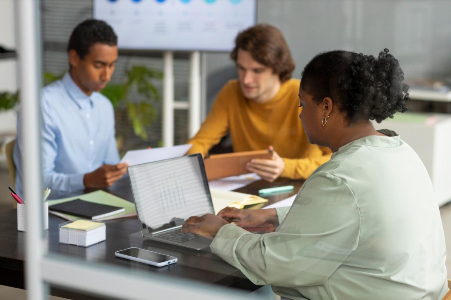 Educational workshop session with instructor presenting investment concepts to engaged participants